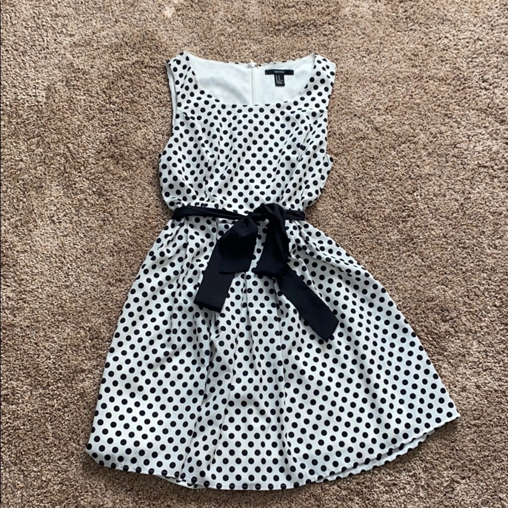 White and black polka dot dress.